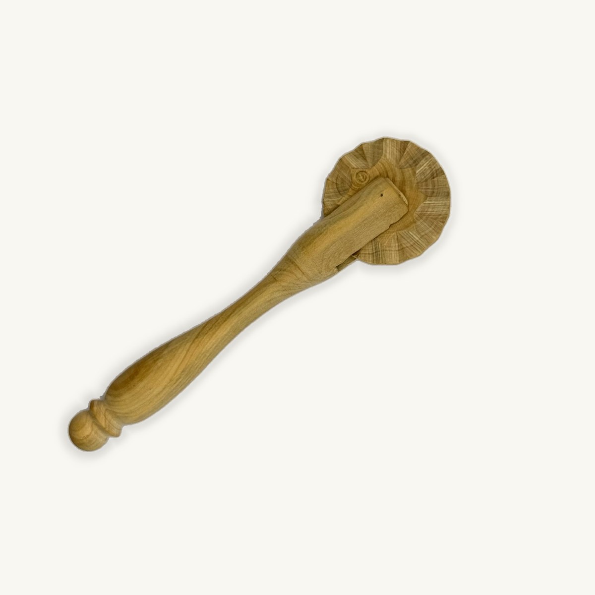 Coupe-pâte à roulette en bois