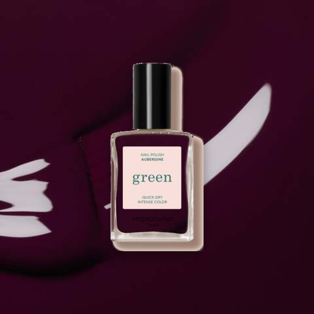 Vernis à ongles Green Manucurist Aubergine sur un fond de sa couleur