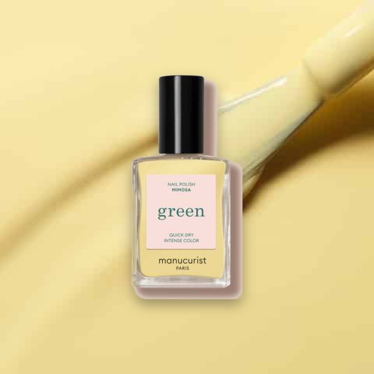 Vernis à ongles Green Manucurist Mimosa sur un fond de sa couleur